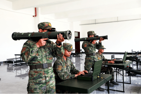 Figure 1: PLA reserve soldiers in formation before new reserve law (with old rank insignia)